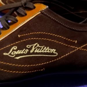 I'm selling a pair of Louis Vuitton casual or dress shoe ,orange leather.